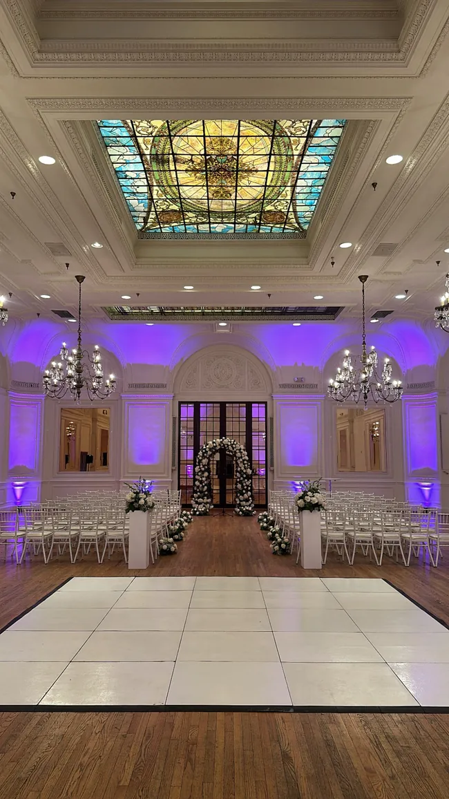 Event space illuminated with uplighting